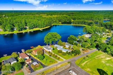 LAKEFRONT PARADISE! You'll never want to leave this charming on Sleepy Creek Golf Club in North Carolina - for sale on GolfHomes.com, golf home, golf lot