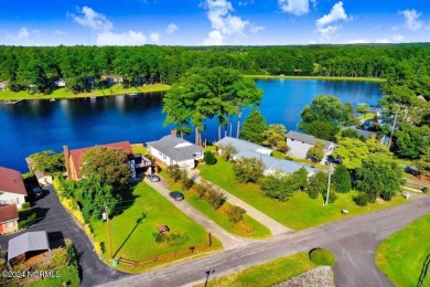 LAKEFRONT PARADISE! You'll never want to leave this charming on Sleepy Creek Golf Club in North Carolina - for sale on GolfHomes.com, golf home, golf lot