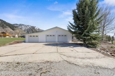 Beautifully landscaped and ideally situated on the 11th fairway on Star Valley RV Golf Course in Wyoming - for sale on GolfHomes.com, golf home, golf lot