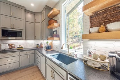 Discover luxury living in this brand-new modern home. The on Bella Vista Country Club and Golf Course in Arkansas - for sale on GolfHomes.com, golf home, golf lot