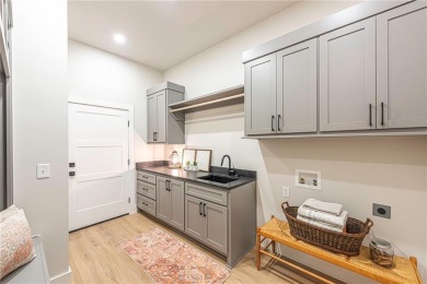 Discover luxury living in this brand-new modern home. The on Bella Vista Country Club and Golf Course in Arkansas - for sale on GolfHomes.com, golf home, golf lot