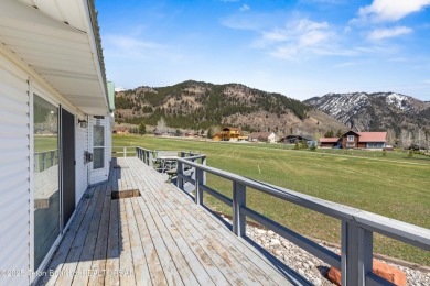 Beautifully landscaped and ideally situated on the 11th fairway on Star Valley RV Golf Course in Wyoming - for sale on GolfHomes.com, golf home, golf lot