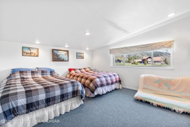 Beautifully landscaped and ideally situated on the 11th fairway on Star Valley RV Golf Course in Wyoming - for sale on GolfHomes.com, golf home, golf lot