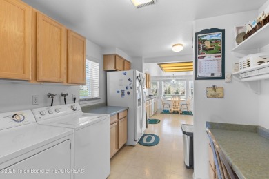 Beautifully landscaped and ideally situated on the 11th fairway on Star Valley RV Golf Course in Wyoming - for sale on GolfHomes.com, golf home, golf lot