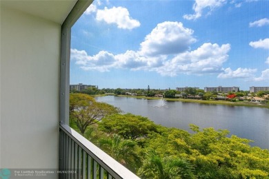 SPECTACULAR WATER VIEWS! Looking for a move in ready condo w/ a on Palm-Aire Country Club and Resort - Palms in Florida - for sale on GolfHomes.com, golf home, golf lot