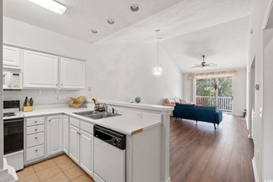 Your coastal top-floor retreat awaits, just 4 miles from the on River Oaks Golf Plantation  in South Carolina - for sale on GolfHomes.com, golf home, golf lot