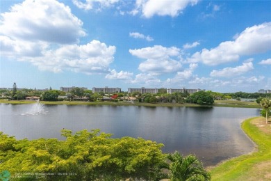 SPECTACULAR WATER VIEWS! Looking for a move in ready condo w/ a on Palm-Aire Country Club and Resort - Palms in Florida - for sale on GolfHomes.com, golf home, golf lot