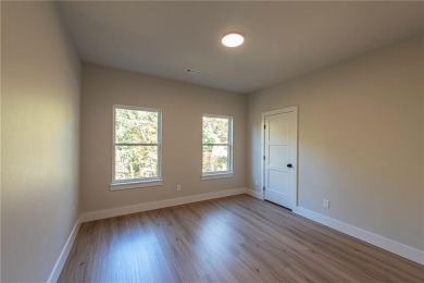 Discover luxury living in this brand-new modern home. The on Bella Vista Country Club and Golf Course in Arkansas - for sale on GolfHomes.com, golf home, golf lot