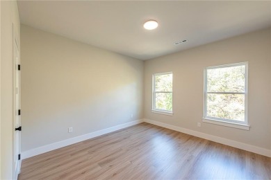 Discover luxury living in this brand-new modern home. The on Bella Vista Country Club and Golf Course in Arkansas - for sale on GolfHomes.com, golf home, golf lot