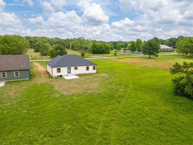 Welcome to 1710 Nashville St! Nestled on a picturesque half-acre on Russellville Country Club in Kentucky - for sale on GolfHomes.com, golf home, golf lot