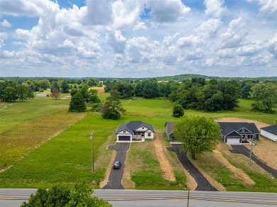 Welcome to 1710 Nashville St! Nestled on a picturesque half-acre on Russellville Country Club in Kentucky - for sale on GolfHomes.com, golf home, golf lot