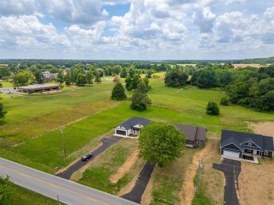 Welcome to 1710 Nashville St! Nestled on a picturesque half-acre on Russellville Country Club in Kentucky - for sale on GolfHomes.com, golf home, golf lot