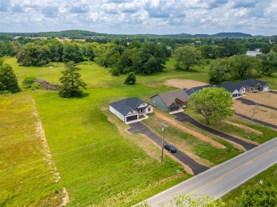 Welcome to 1710 Nashville St! Nestled on a picturesque half-acre on Russellville Country Club in Kentucky - for sale on GolfHomes.com, golf home, golf lot