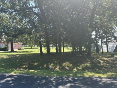 This premium lot is located on 7th fairway of beautiful Lake on Lake Kiowa Golf Course in Texas - for sale on GolfHomes.com, golf home, golf lot