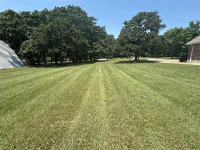 This premium lot is located on 7th fairway of beautiful Lake on Lake Kiowa Golf Course in Texas - for sale on GolfHomes.com, golf home, golf lot