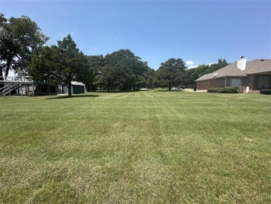 This premium lot is located on 7th fairway of beautiful Lake on Lake Kiowa Golf Course in Texas - for sale on GolfHomes.com, golf home, golf lot