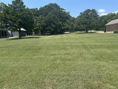 This premium lot is located on 7th fairway of beautiful Lake on Lake Kiowa Golf Course in Texas - for sale on GolfHomes.com, golf home, golf lot