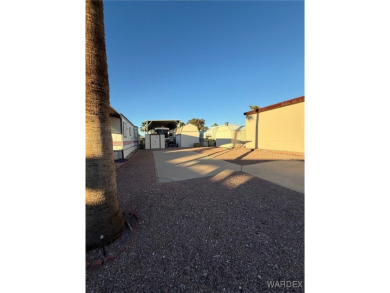 This centrally located RV lot in Riverview RV Resort is the on Riverview Golf Course in Arizona - for sale on GolfHomes.com, golf home, golf lot