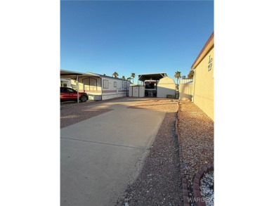 This centrally located RV lot in Riverview RV Resort is the on Riverview Golf Course in Arizona - for sale on GolfHomes.com, golf home, golf lot