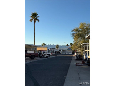 This centrally located RV lot in Riverview RV Resort is the on Riverview Golf Course in Arizona - for sale on GolfHomes.com, golf home, golf lot