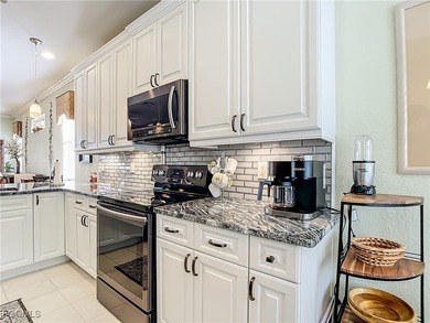 WOW! Stunning, move-in ready turnkey Jasmine Model located in on Herons Glen Golf and Country Club in Florida - for sale on GolfHomes.com, golf home, golf lot