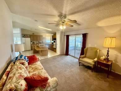 Home is located in Water Oak Country Club Estates, an active 55 on Water Oak Country Club Estates in Florida - for sale on GolfHomes.com, golf home, golf lot