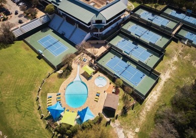 This custom home boasts captivating curb appeal and is an on The Hills of Lakeway Golf Course in Texas - for sale on GolfHomes.com, golf home, golf lot
