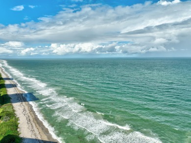 Wake up to sunrise over the blue ocean water at the sought after on Island Dunes Country Club in Florida - for sale on GolfHomes.com, golf home, golf lot