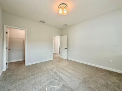 Discover this stunning 4-bedroom, 3.5-bath luxury home on Providence Golf Club in Florida - for sale on GolfHomes.com, golf home, golf lot