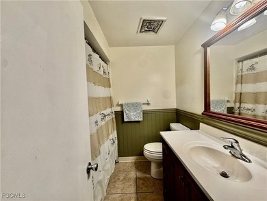 Enjoy easy, ground-floor living in this beautifully situated on El Rio Golf Course and Club in Florida - for sale on GolfHomes.com, golf home, golf lot