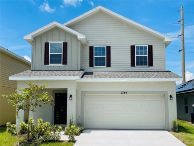 This brand new 4 bedroom, 2.5 bathroom residence offers on Harmony Golf Preserve in Florida - for sale on GolfHomes.com, golf home, golf lot
