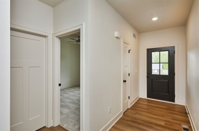 Welcome to this beautifully designed new construction home on Osceola Country Club in Iowa - for sale on GolfHomes.com, golf home, golf lot