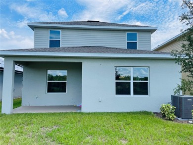 This brand new 4 bedroom, 2.5 bathroom residence offers on Harmony Golf Preserve in Florida - for sale on GolfHomes.com, golf home, golf lot