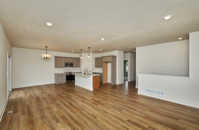 Welcome to this beautifully designed new construction home on Osceola Country Club in Iowa - for sale on GolfHomes.com, golf home, golf lot