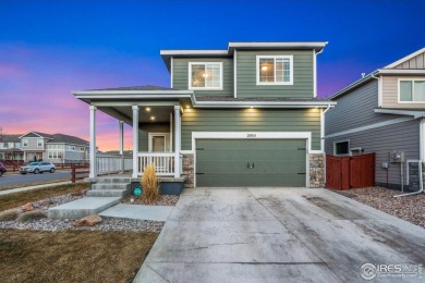 This stunning 2-story home in Windsor's sought-after RainDance on Raindance National Golf Course in Colorado - for sale on GolfHomes.com, golf home, golf lot