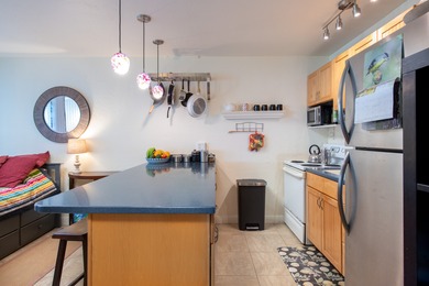 Ocean, sunset, golf and Maui views from a Waikoloa Village condo on Waikoloa Village Golf Club in Hawaii - for sale on GolfHomes.com, golf home, golf lot