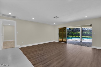 Boasting 3 bedrooms plus a den, 2.5 baths, and a 2-car garage on LaPlaya Golf Club in Florida - for sale on GolfHomes.com, golf home, golf lot