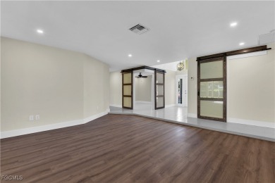 Boasting 3 bedrooms plus a den, 2.5 baths, and a 2-car garage on LaPlaya Golf Club in Florida - for sale on GolfHomes.com, golf home, golf lot