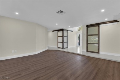 Boasting 3 bedrooms plus a den, 2.5 baths, and a 2-car garage on LaPlaya Golf Club in Florida - for sale on GolfHomes.com, golf home, golf lot