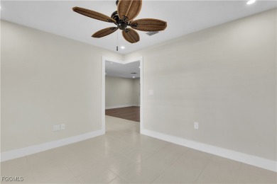 Boasting 3 bedrooms plus a den, 2.5 baths, and a 2-car garage on LaPlaya Golf Club in Florida - for sale on GolfHomes.com, golf home, golf lot