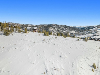 Great 1/3 acre lot with views down the valley and towards Winter on Headwaters Golf Course At Granby Ranch in Colorado - for sale on GolfHomes.com, golf home, golf lot