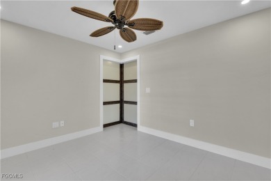 Boasting 3 bedrooms plus a den, 2.5 baths, and a 2-car garage on LaPlaya Golf Club in Florida - for sale on GolfHomes.com, golf home, golf lot