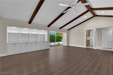 Boasting 3 bedrooms plus a den, 2.5 baths, and a 2-car garage on LaPlaya Golf Club in Florida - for sale on GolfHomes.com, golf home, golf lot