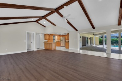 Boasting 3 bedrooms plus a den, 2.5 baths, and a 2-car garage on LaPlaya Golf Club in Florida - for sale on GolfHomes.com, golf home, golf lot