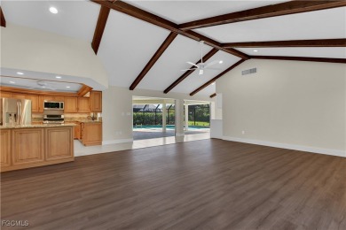 Boasting 3 bedrooms plus a den, 2.5 baths, and a 2-car garage on LaPlaya Golf Club in Florida - for sale on GolfHomes.com, golf home, golf lot