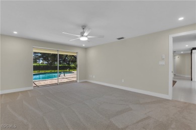 Boasting 3 bedrooms plus a den, 2.5 baths, and a 2-car garage on LaPlaya Golf Club in Florida - for sale on GolfHomes.com, golf home, golf lot