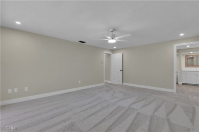 Boasting 3 bedrooms plus a den, 2.5 baths, and a 2-car garage on LaPlaya Golf Club in Florida - for sale on GolfHomes.com, golf home, golf lot