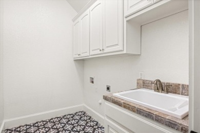 Backyard dreams, elegant upgrades, and the perfect balance of on Harbor Lakes Golf Club in Texas - for sale on GolfHomes.com, golf home, golf lot