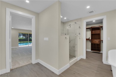 Boasting 3 bedrooms plus a den, 2.5 baths, and a 2-car garage on LaPlaya Golf Club in Florida - for sale on GolfHomes.com, golf home, golf lot