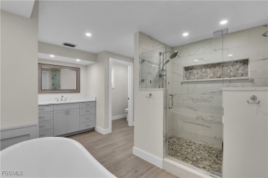 Boasting 3 bedrooms plus a den, 2.5 baths, and a 2-car garage on LaPlaya Golf Club in Florida - for sale on GolfHomes.com, golf home, golf lot